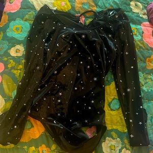 This is a velvet bodysuit. It was never worn and new!